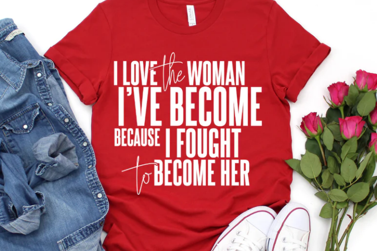 I Love the Woman I've Become Shirt - Susanna Anderson.PNG__PID:a802b005-ae93-44ed-a5d8-816e67e957b0